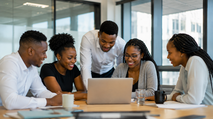 Young South African interns working together in a modern office during a paid internship programme